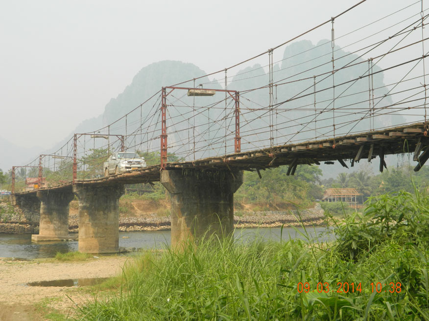 The only road bridge across the Song River in Vang Vieng