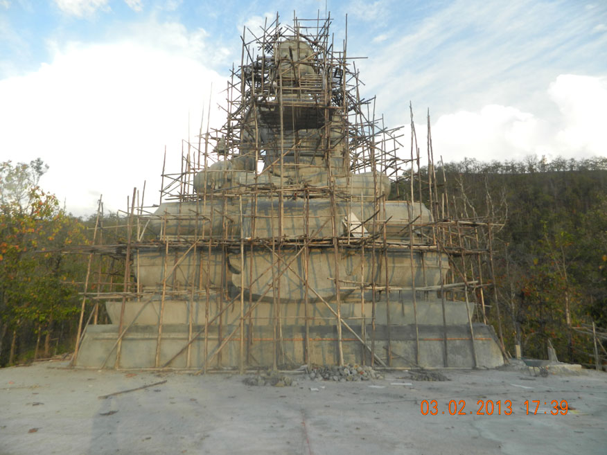 A new Buddha image being constructed on the hill above Wat Phra That Mae Yen.